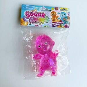 NEW Orb Curiosities Sugar Swaps Onesies Series 2 Pink Glitter Squishy Baby